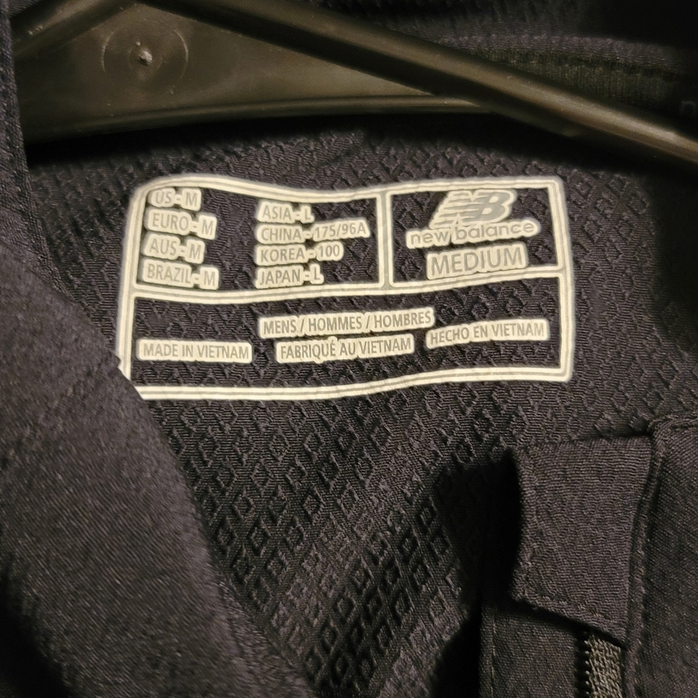 Medium, new balance zip up jacket black in color